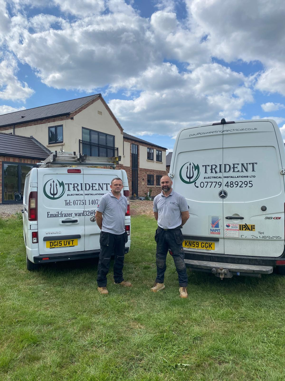 Trident Electrical Installations team with company vans at residential property in Hull